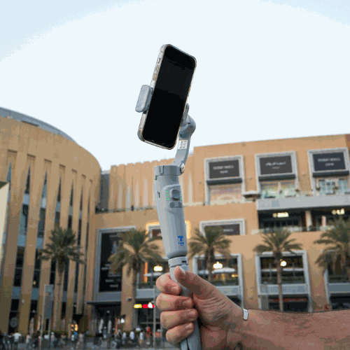 Gimbal Glide Pro smartphone stabilizer in use outdoors.